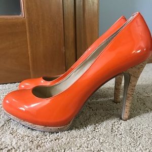 Orange patent leather pump with cork heel